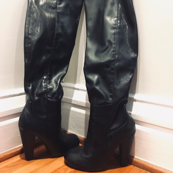 Over the knee boot with heels.